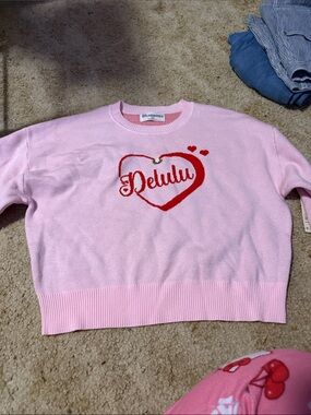 No Boundaries Light Pink Crewneck Sweater with Red Heart Graphic